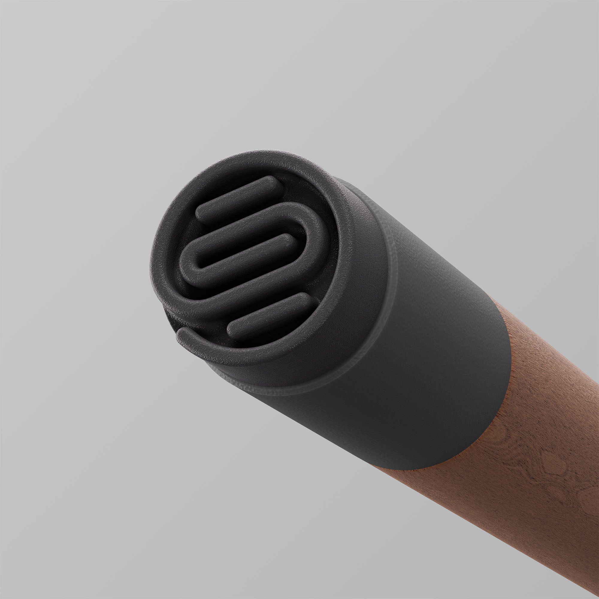 Uno. Graphite and Walnut