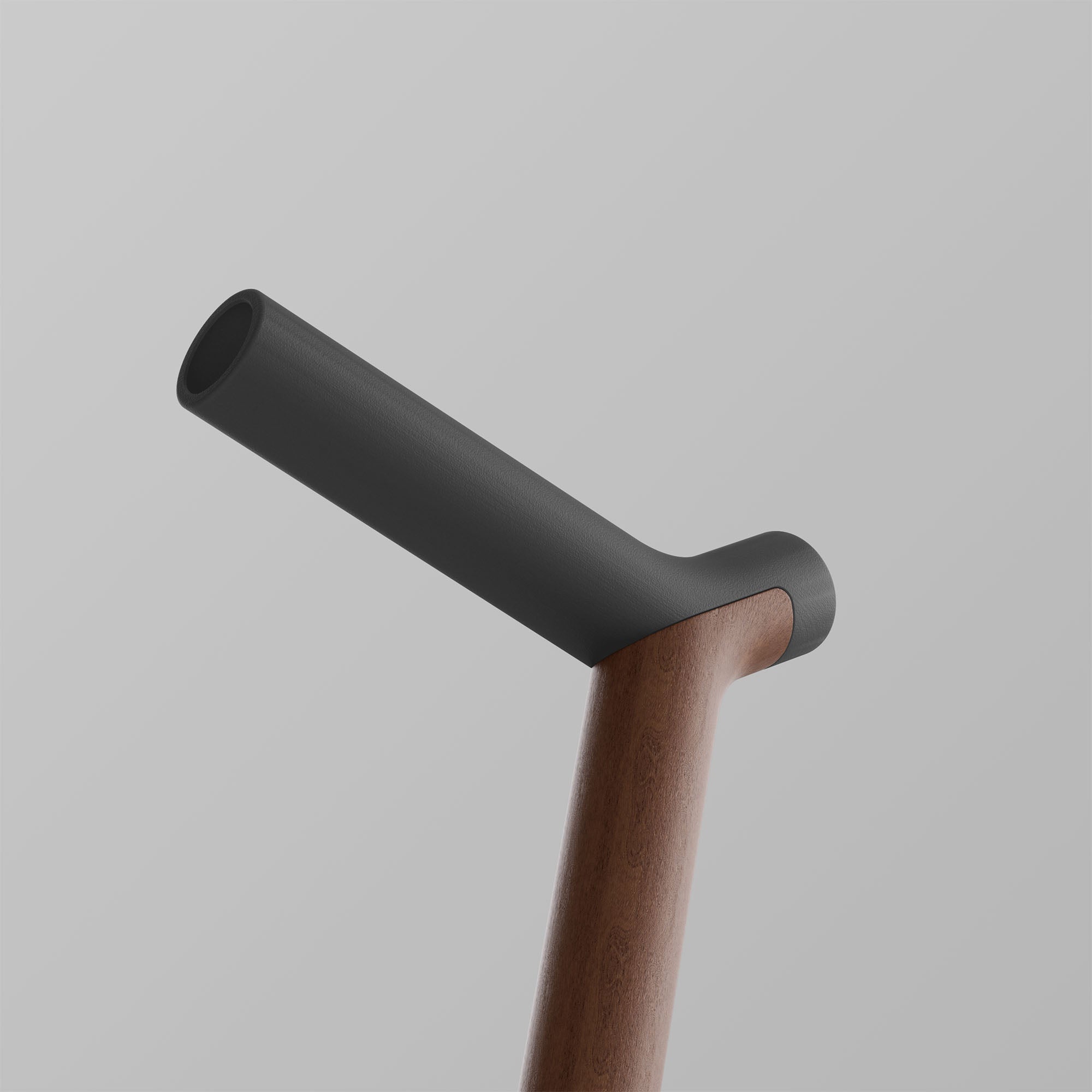 Uno. Graphite and Walnut