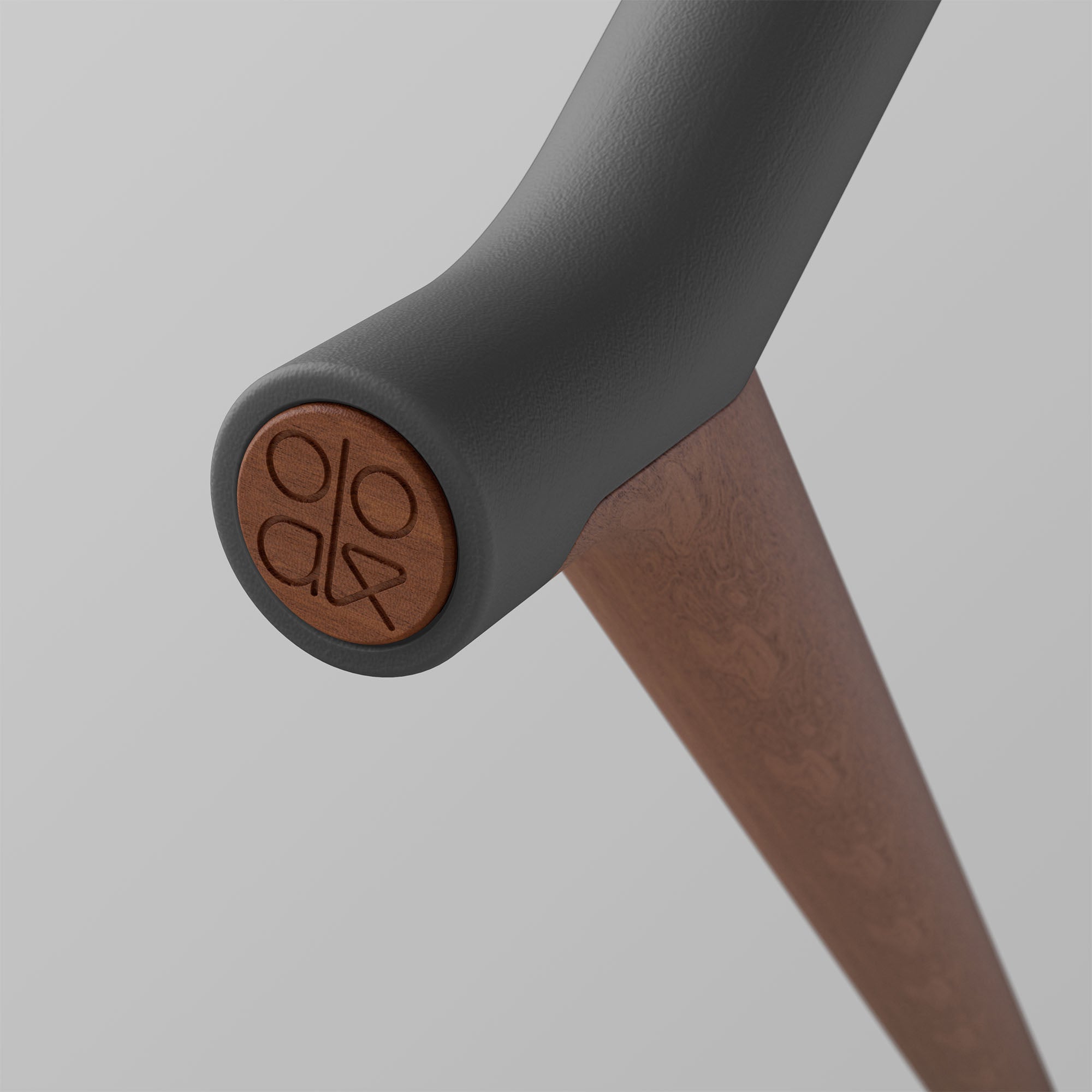 Uno. Graphite and Walnut