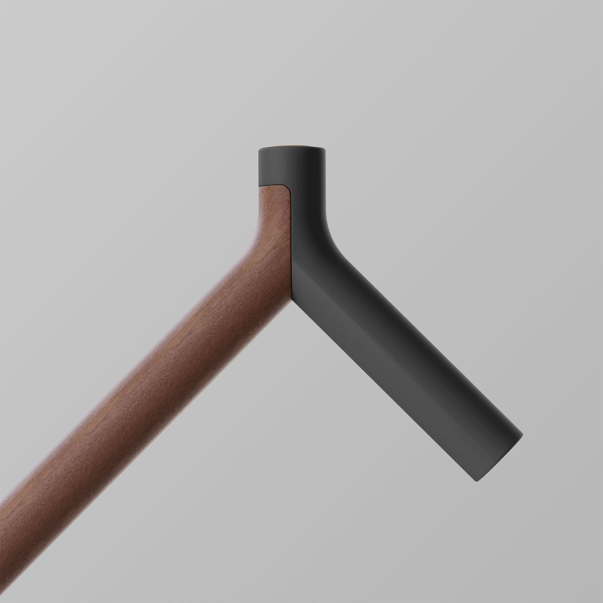 Uno. Graphite and Walnut