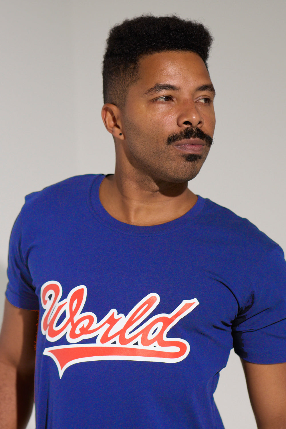 WORLD 5065 Flow T-Shirt Blue w/ WORLD Flash Signature Orange/White (UNISEX)